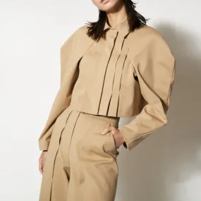 Beige structure signature pleated crop jacket