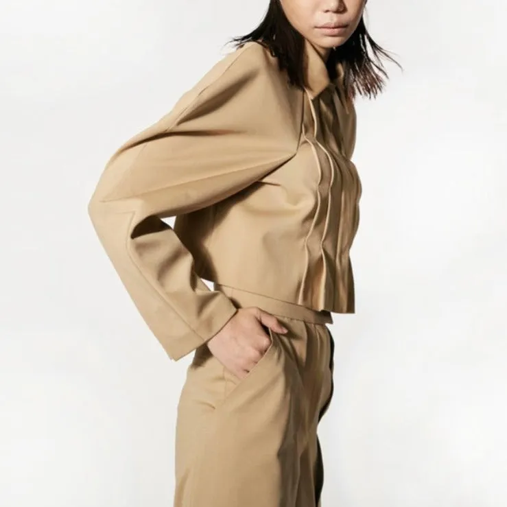 Beige structure signature pleated crop jacket