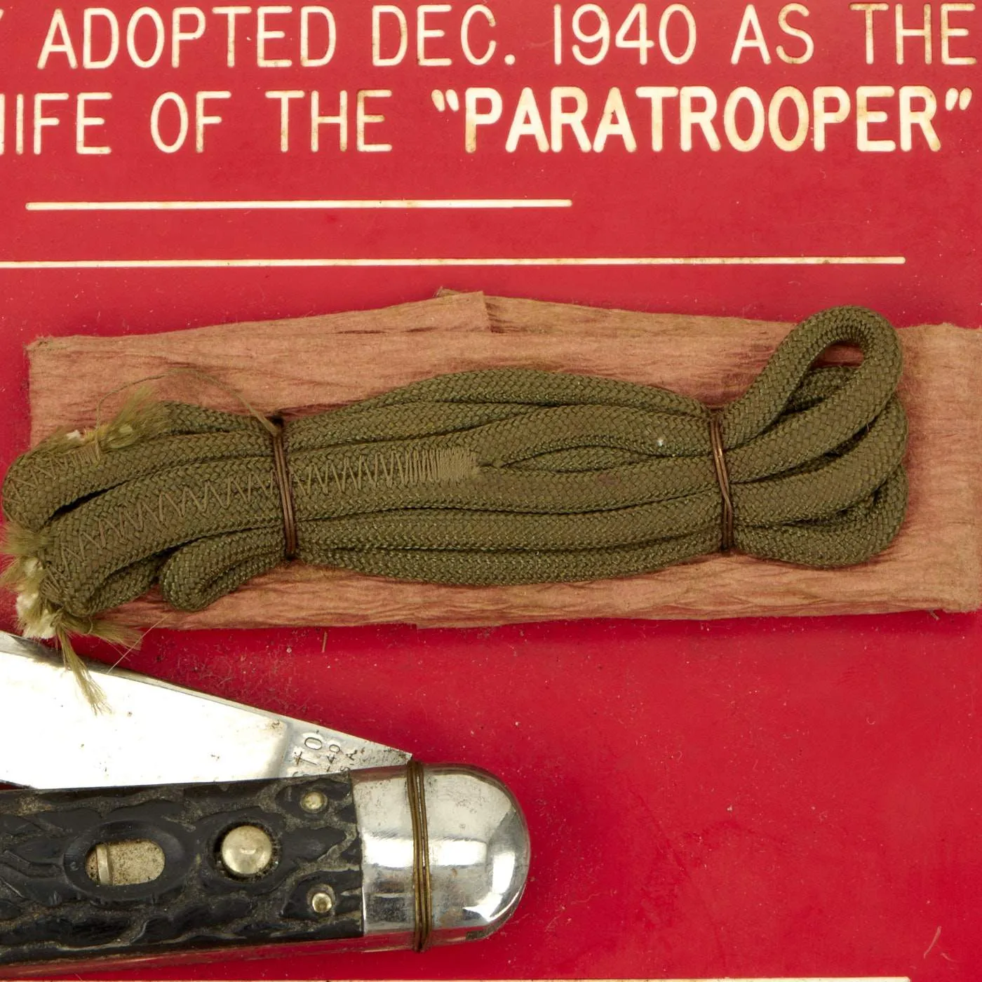 Original U.S. WWII Unissued Airborne Schrade "Presto" M2 Knife with Plastic Handle on Display Board