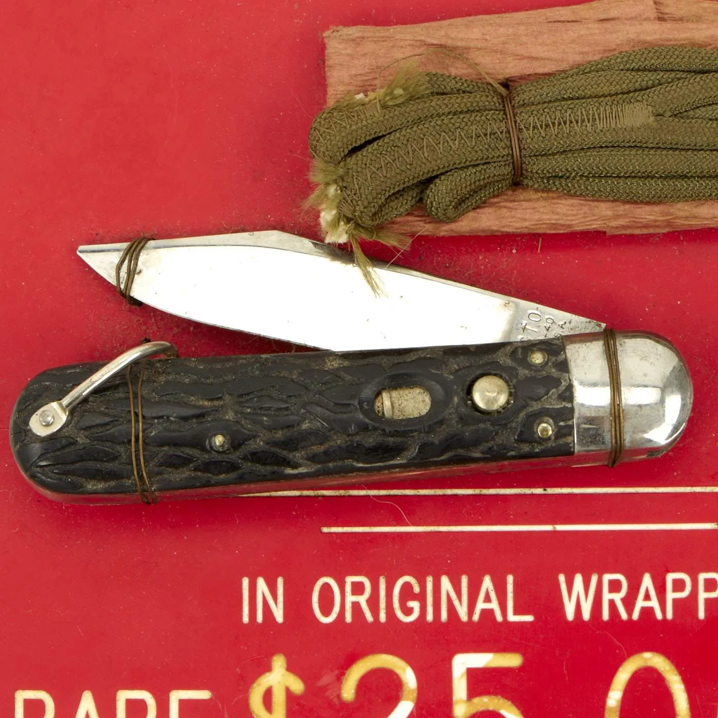 Original U.S. WWII Unissued Airborne Schrade "Presto" M2 Knife with Plastic Handle on Display Board